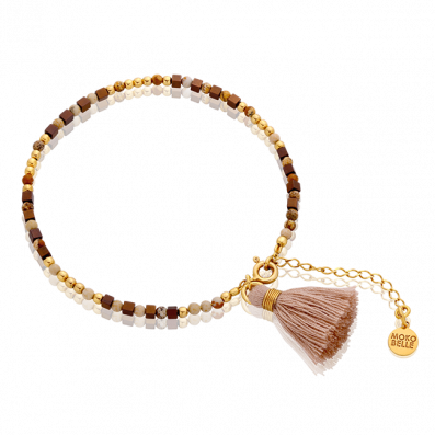 Bracelet of hematite and jasper with a beige tassel